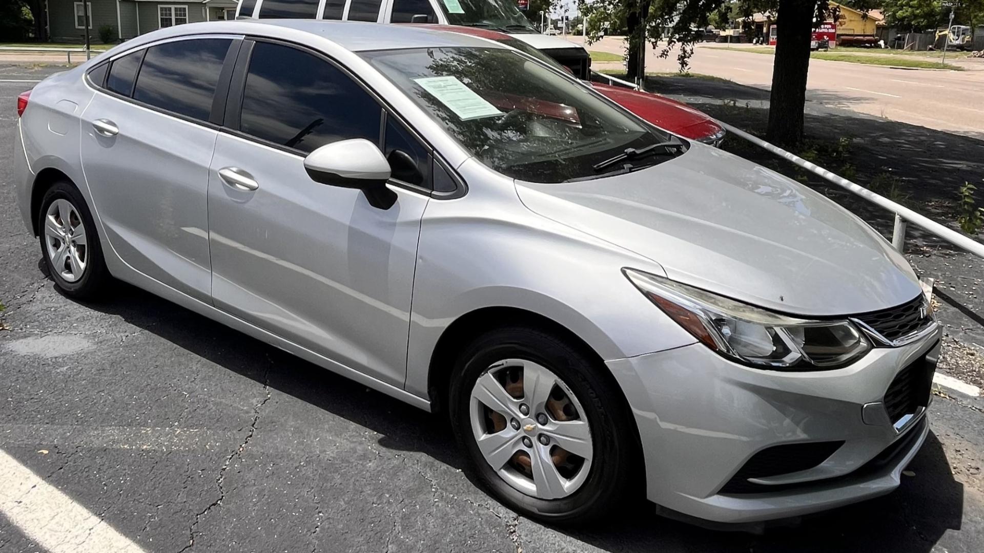 2016 Chevrolet Cruze LS Auto (1G1BC5SM3G7) with an 1.4L L4 DOHC 16V TURBO engine, 6A transmission, located at 945 E. Jefferson Blvd, Dallas, TX, 75203, (214) 943-7777, 32.752514, -96.811630 - Photo#1